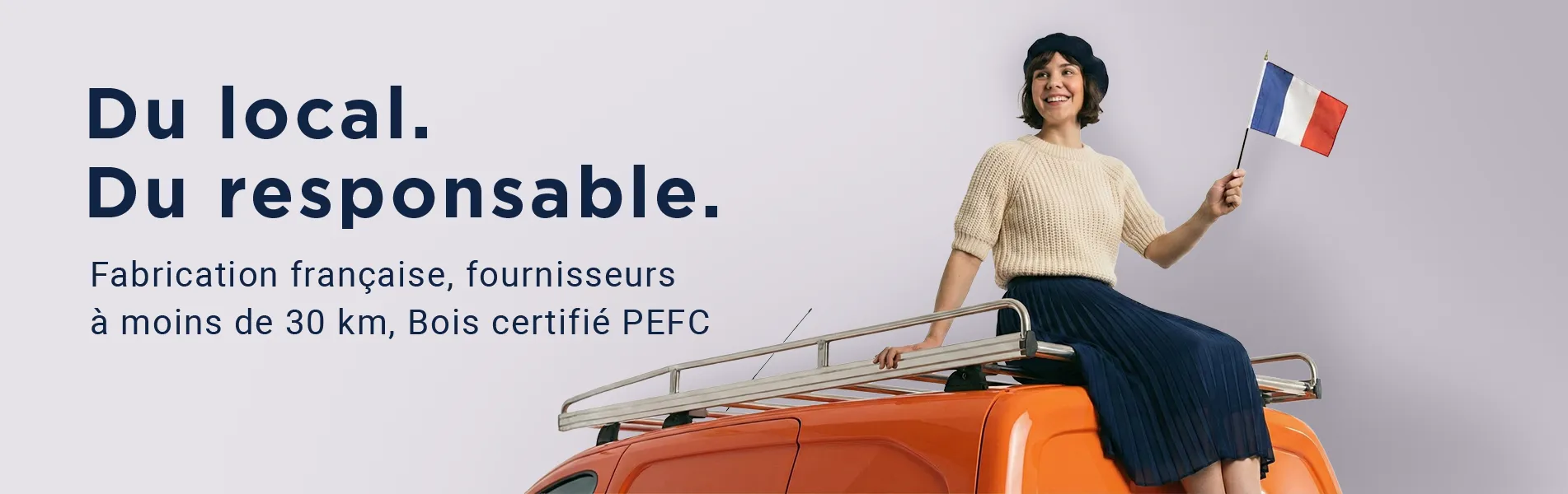 Fabrication locale et responsable - personne sur un utilitaire avec drapeau français